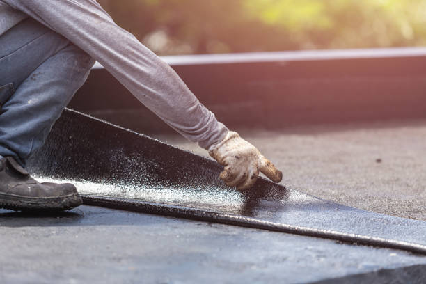 Professional Waterproofing technician working in Olcott, NY